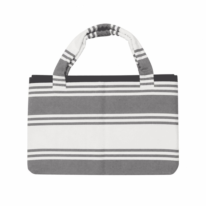 A foldable beach towel bag in grey and white stripes, featuring sturdy handles and a fabric texture.
