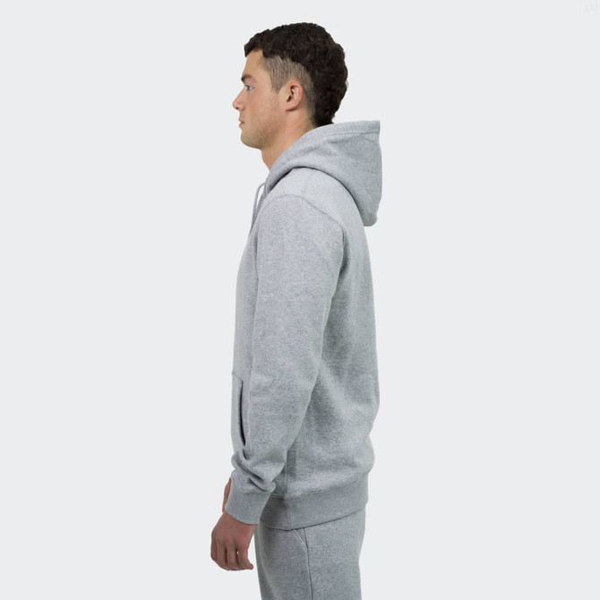 A grey unisex hoodie with a front pocket, featuring a hood, displayed from the side.