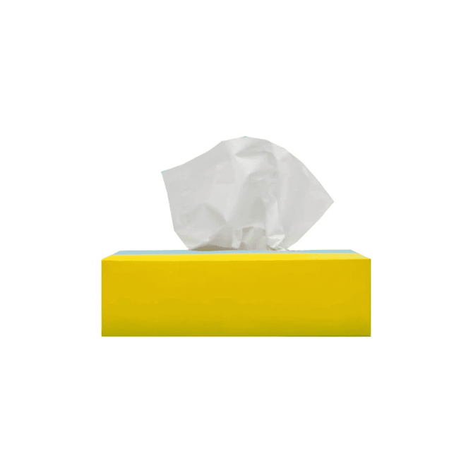 A rectangular tissue box in bright yellow with a white tissue partially pulled out from the top.