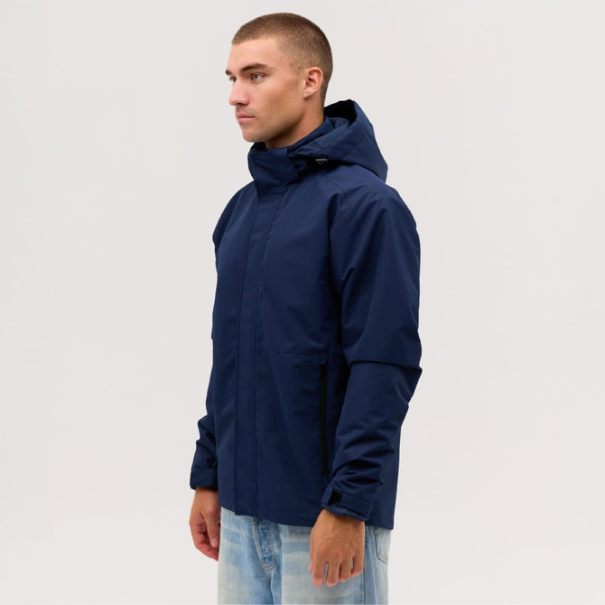 A navy utility jacket with a hood displayed on a model, featuring a sleek, modern design.