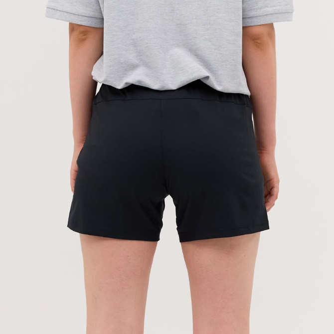 Black running shorts are displayed on a person, viewed from the back, with a grey t-shirt partially visible.