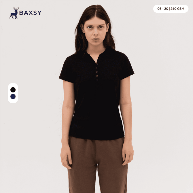 A black women's polo shirt with a buttoned collar displayed on a model, featuring a logo.