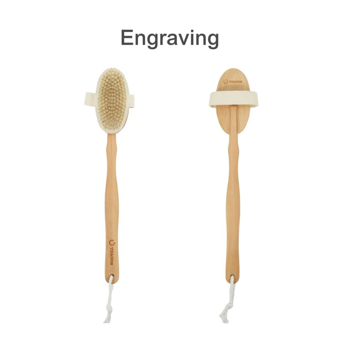 A detachable shower brush with a long wooden handle and natural bristles, featuring a strap for grip.
