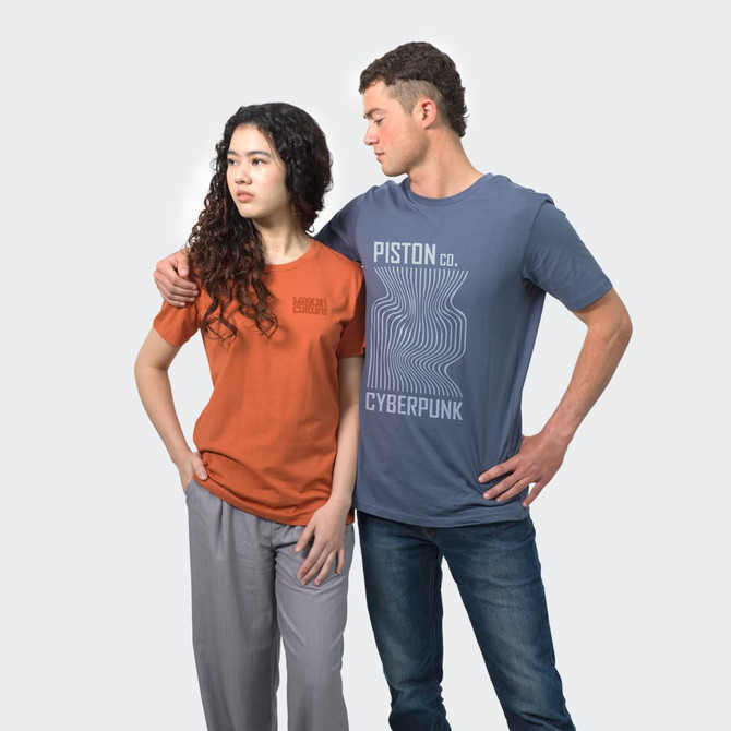A blue men's T-shirt with a logo, paired with an orange women's T-shirt, both displayed on models.
