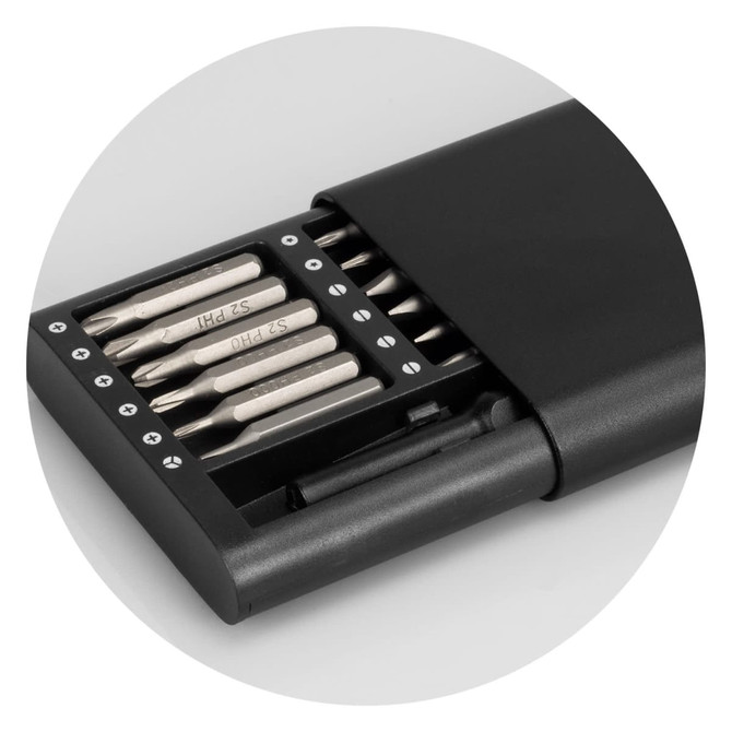 A black screwdriver set with various bits stored in a compact case featuring a logo.