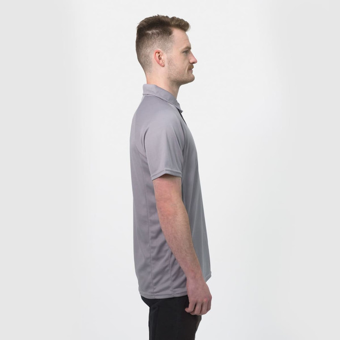 A grey men's polo shirt with a collar, featuring a subtle logo, displayed on a model from the side.