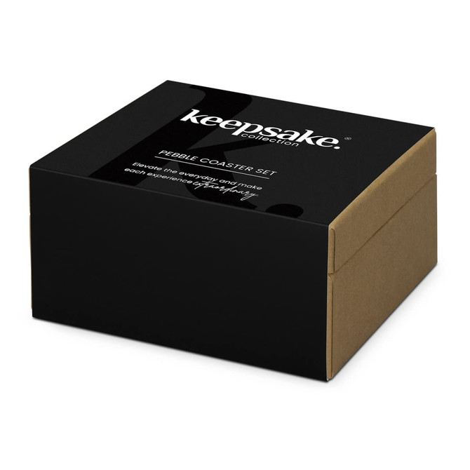 A black and brown box containing the Keepsake Pebble Coaster Set, featuring a logo on the front.