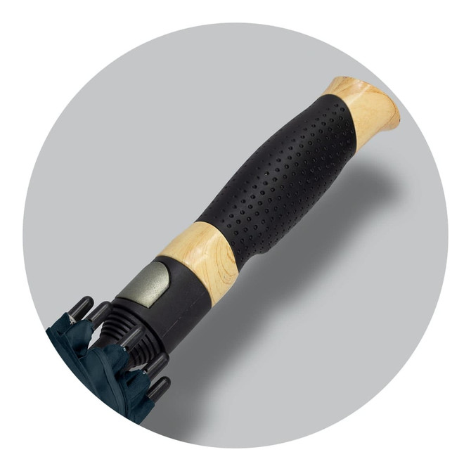 A dark green sports umbrella featuring a textured black handle with a wooden finish and a metal tip.