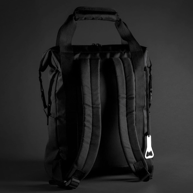 A black cooler tote pack with padded shoulder straps and a zipper closure, featuring a bottle opener attachment.