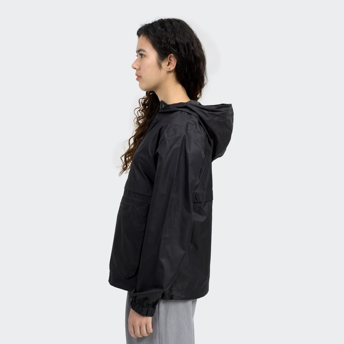 A black women's windbreaker jacket featuring a hood and a logo. The model is posed in profile against a light background.