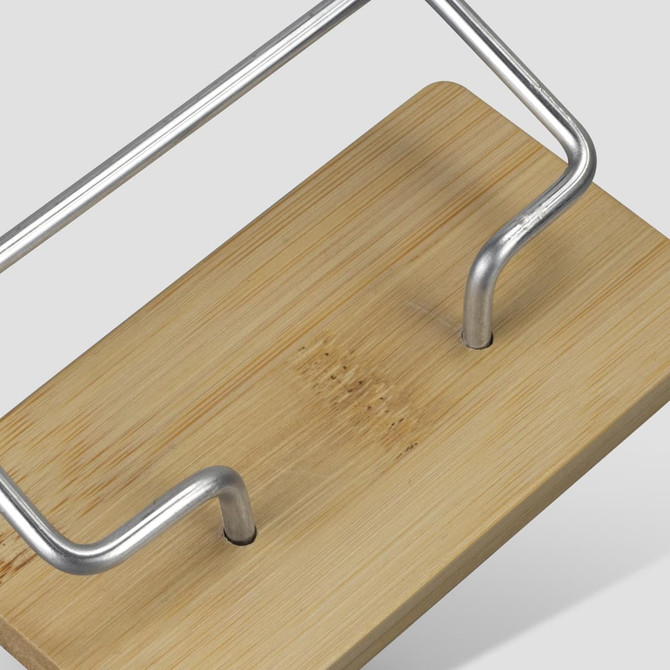 A bamboo business card stand with a metal frame featuring a clean, natural finish. The base is made of light-coloured bamboo.