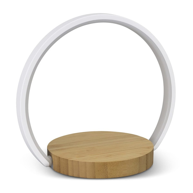 A wireless charging night light featuring a circular white frame and a round bamboo base.