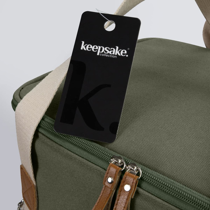 A green cooler bag with a zip closure and a tag featuring a logo. It has tan accents and a shoulder strap.