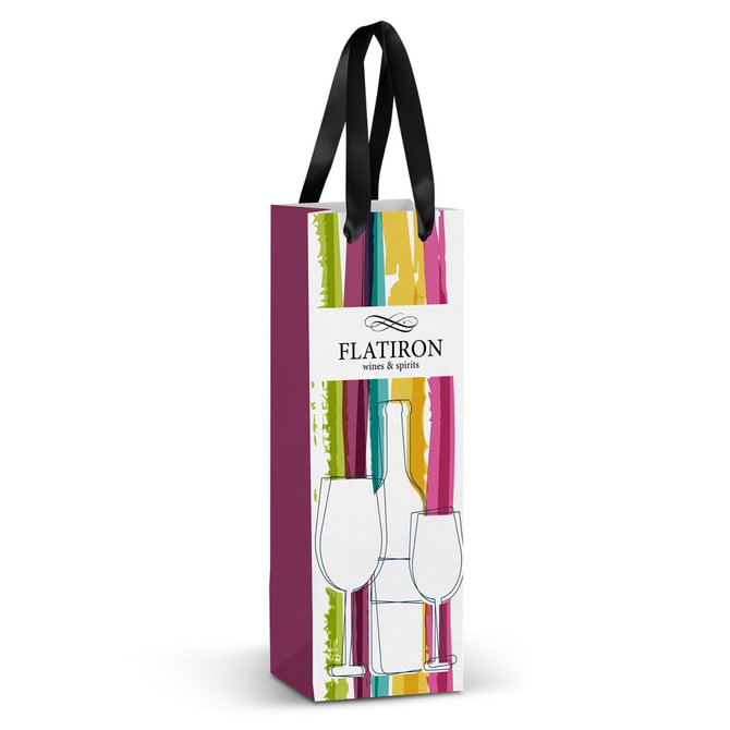 A full-colour paper bag in shades of pink, green, and yellow, with a black ribbon handle and a logo.