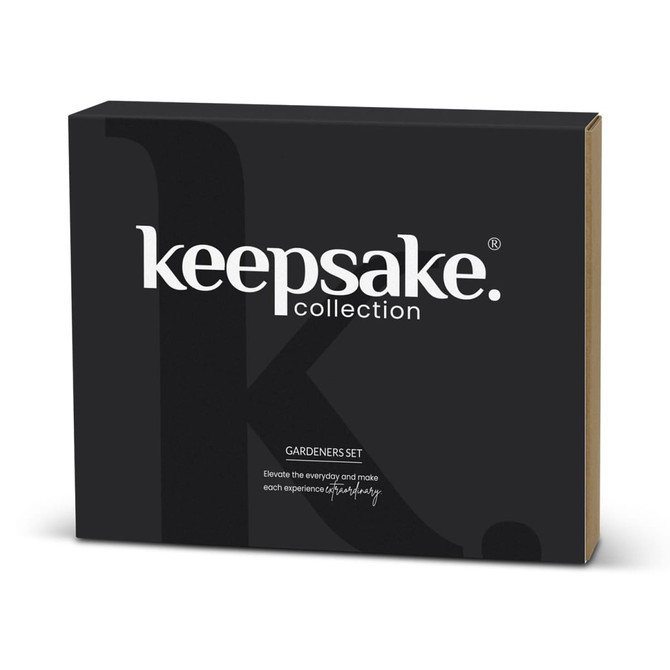A black gift box containing the Keepsake Gardeners Set, featuring a logo on the front.