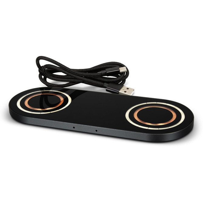 A sleek black dual wireless charger with gold accents and a USB cable. It features a modern design and branding.