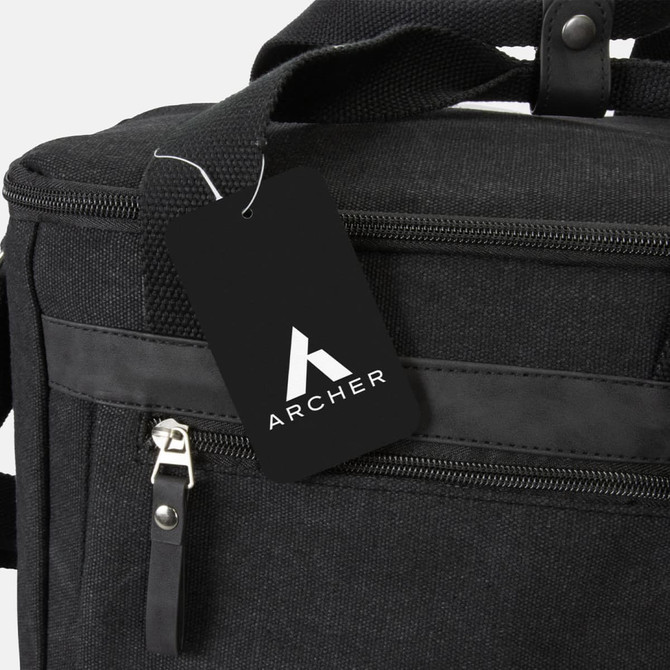 A black canvas cooler bag featuring a zippered compartment and a branded tag.