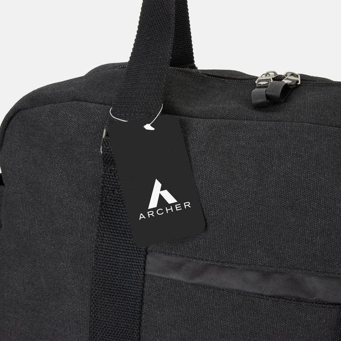A black canvas duffle bag with a shoulder strap and a tag featuring a logo.