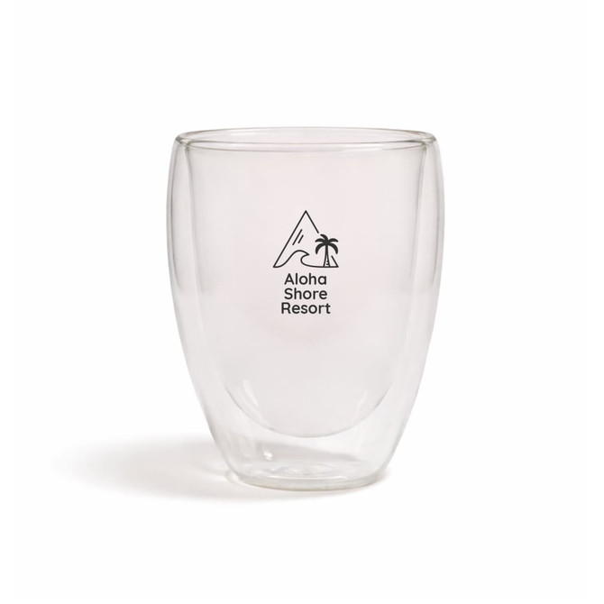 A drink bottle featuring a clear double wall design with a black logo and a mountain and palm tree graphic.
