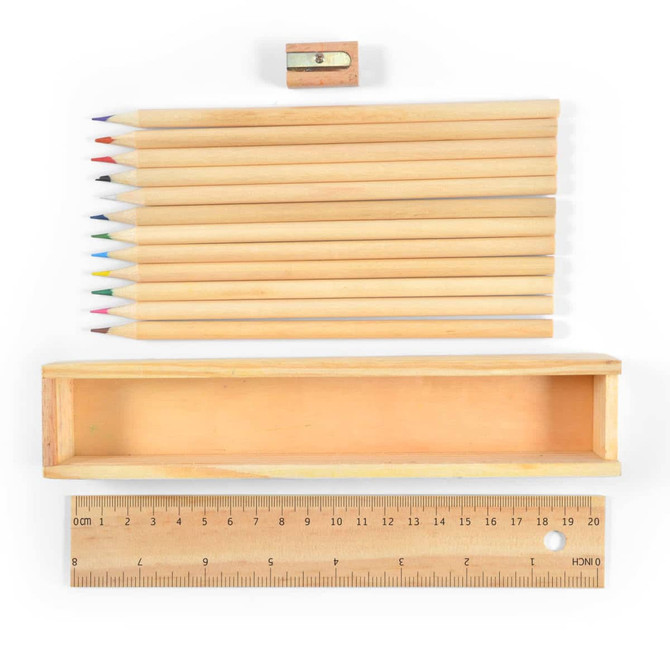 A wooden box containing a set of colored pencils in various colors, with a sharpener and a wooden ruler.