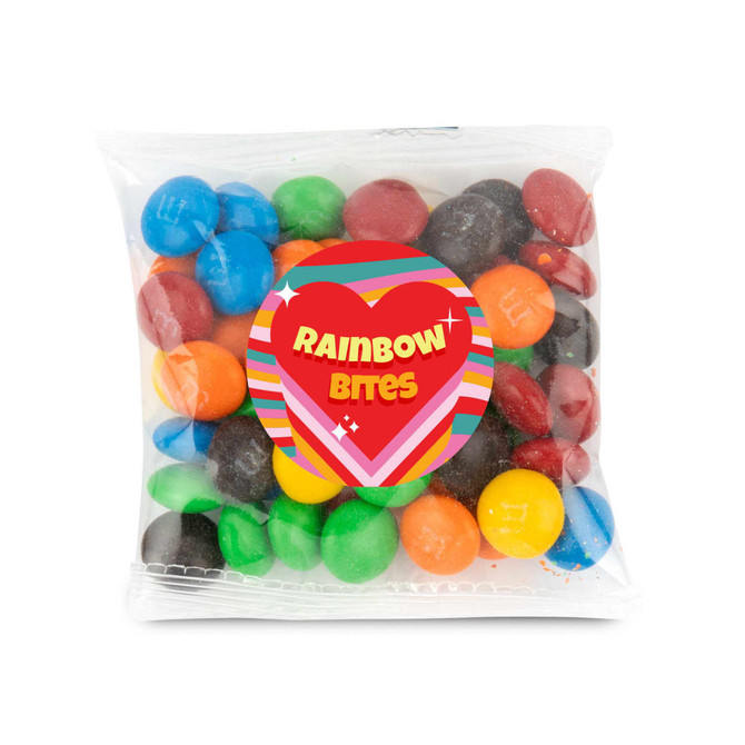 A 50 gram cello bag contains colorful chocolate-coated candies labeled as "Rainbow Bites."