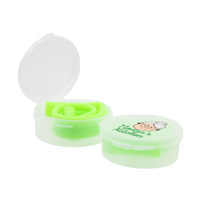 A green silicone straw neatly coiled inside a clear case with a round lid featuring a logo.