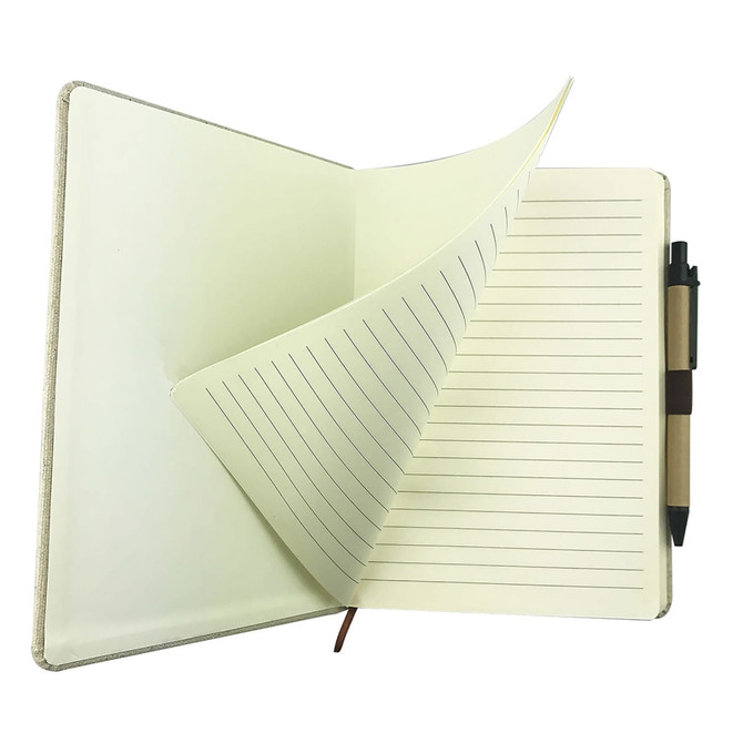 A cotton notebook with a beige cover, featuring lined pages and a black pen attached.
