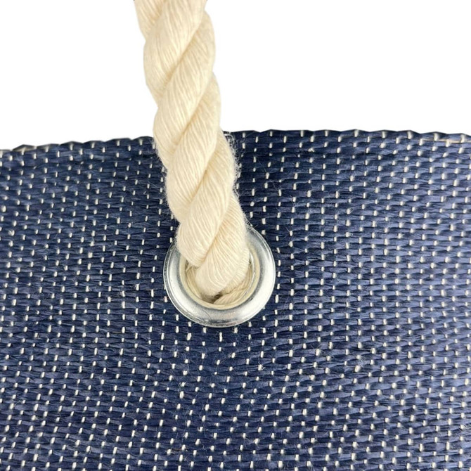 Kraft paper tote bag featuring cream-coloured rope handles and a metallic grommet in navy blue material.