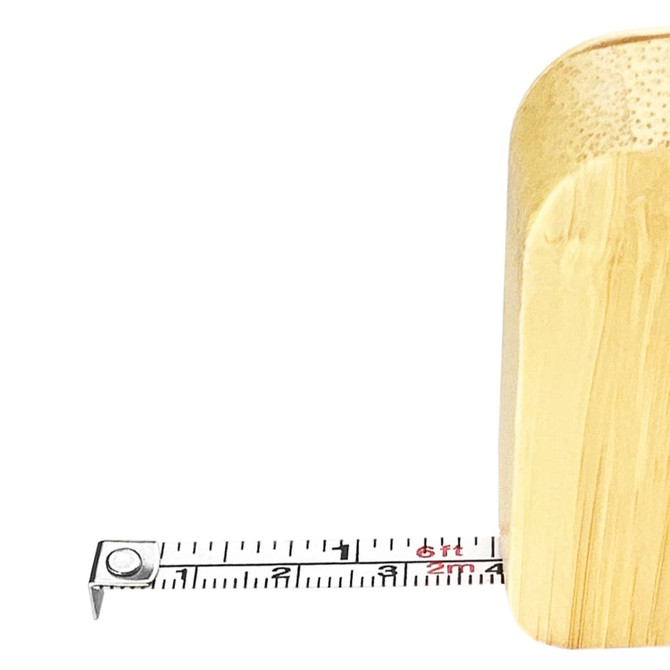 A bamboo tape measure key ring in natural brown, with a visible retractable tape marked in centimetres.