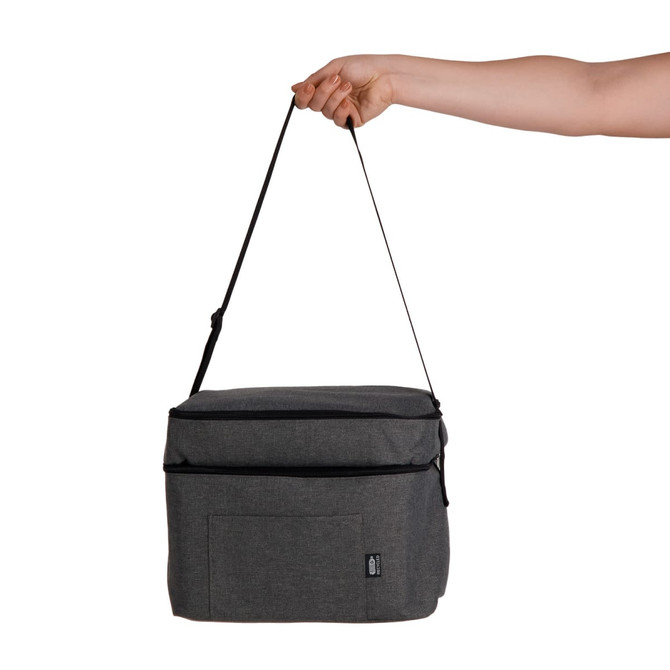 A hand holds a grey cooler bag with a strap, featuring a front pocket and zipper closure. It has a logo.