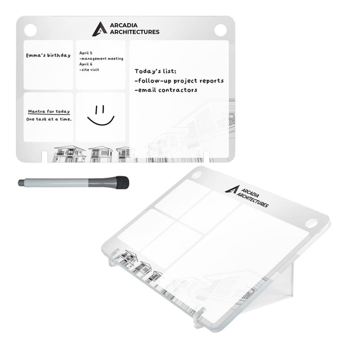 A transparent desk planner featuring sections for notes and reminders, with a black marker. It has a logo and is sleek in design.