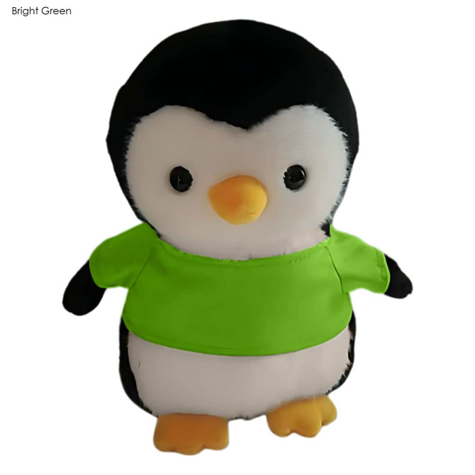 A plush toy penguin with a black and white body and a bright green shirt. It has round black eyes and an orange beak.