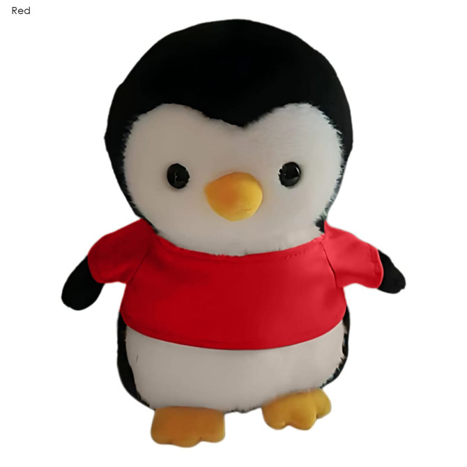 A plush penguin toy with a black and white body, yellow beak, and wearing a red shirt. It has black buttons for eyes.