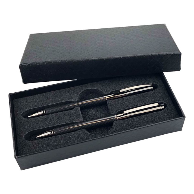 A black gift box contains a carbon pen and pencil set, featuring a sleek design and silver accents.