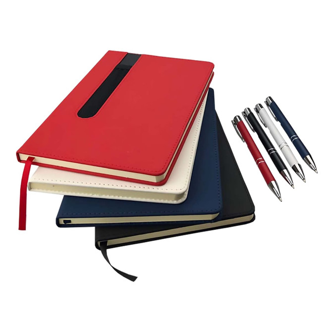 A stack of notebooks in red, white, navy, and black, accompanied by three pens in blue, black, and red.