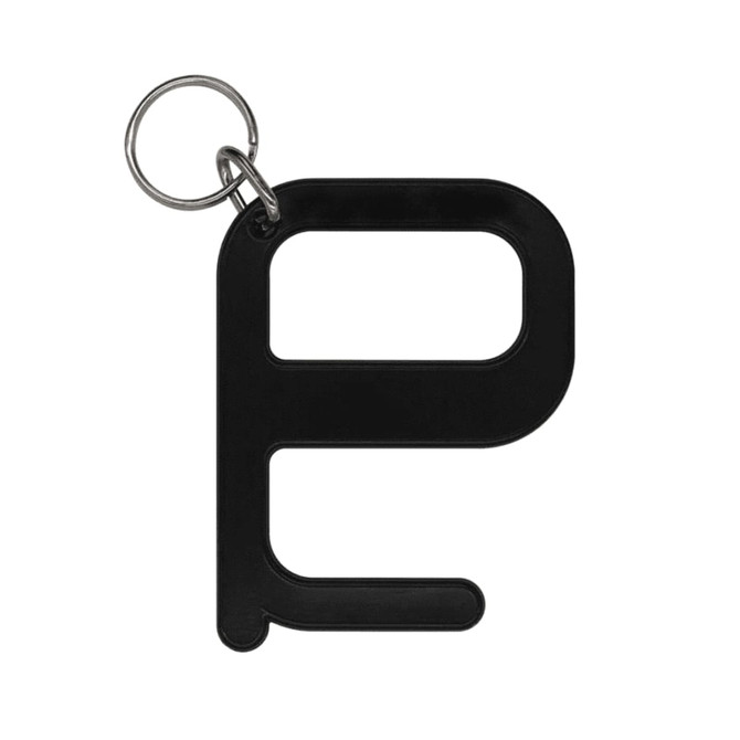 A black hygiene key with a keyring attachment. The design features a simple shape.