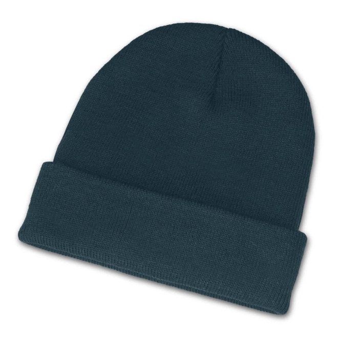 A beanie in a dark teal color featuring a rolled cuff design.
