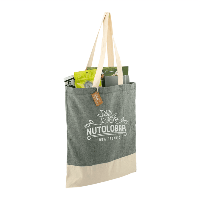 A grey and cream tote bag featuring a logo, filled with various items and equipped with sturdy handles.