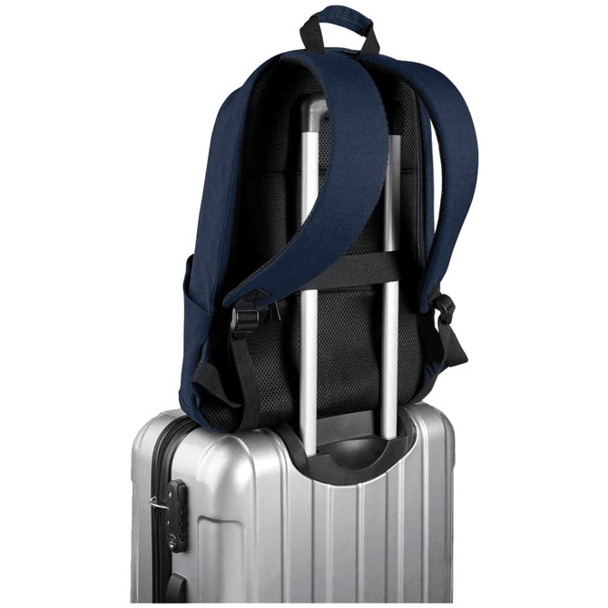 A navy blue laptop backpack with adjustable straps resting on a silver suitcase. It has a logo on the side.