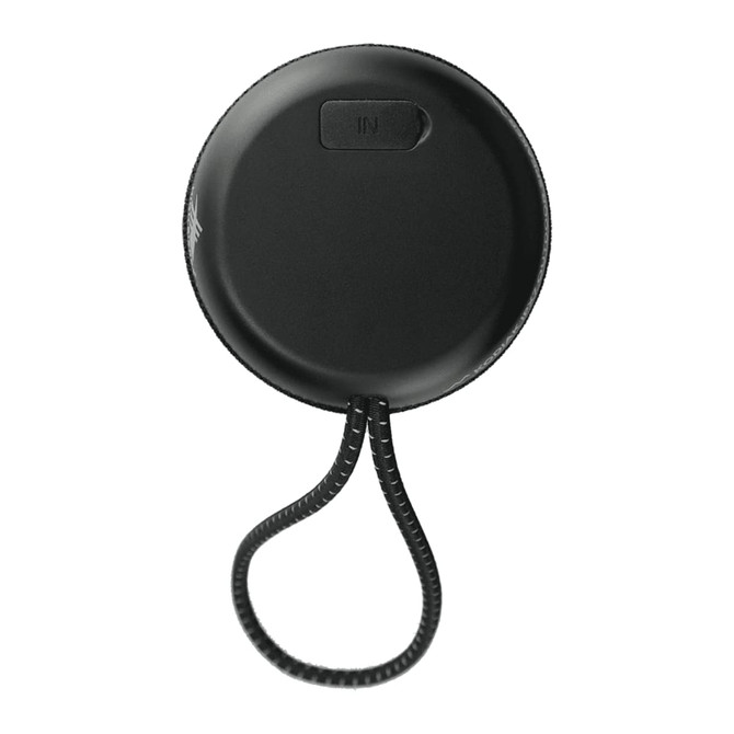 A black Bluetooth speaker with a textured surface, featuring a looped strap and a small input section.