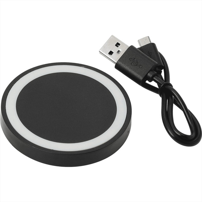 A black wireless charging pad with a white rim, accompanied by a USB charging cable.