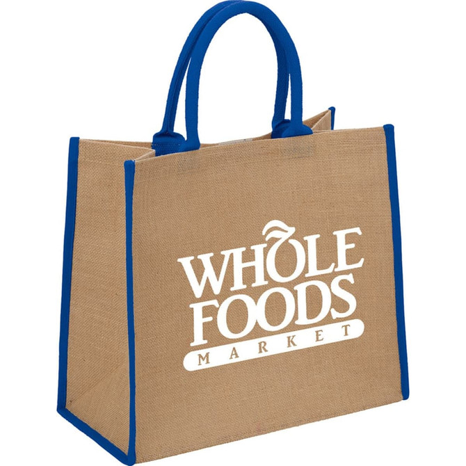 A large jute tote bag in natural brown with blue handles and a logo.