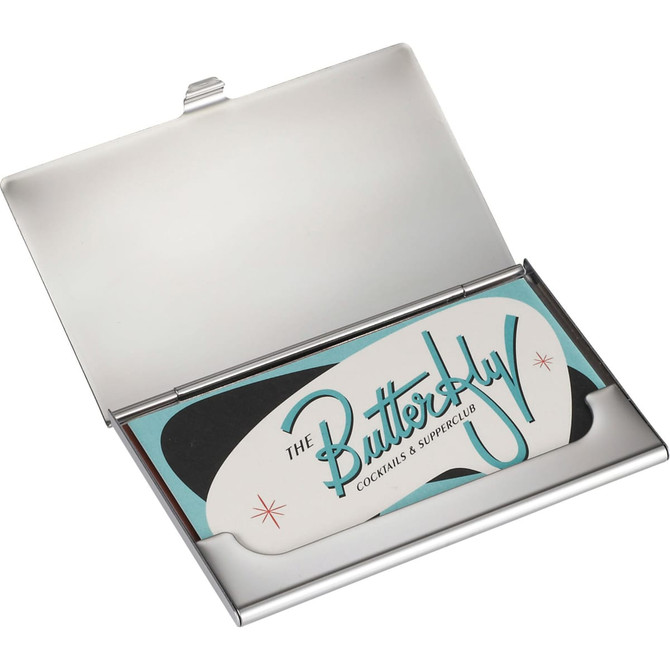 A silver business card holder with an open lid displaying a card inside.