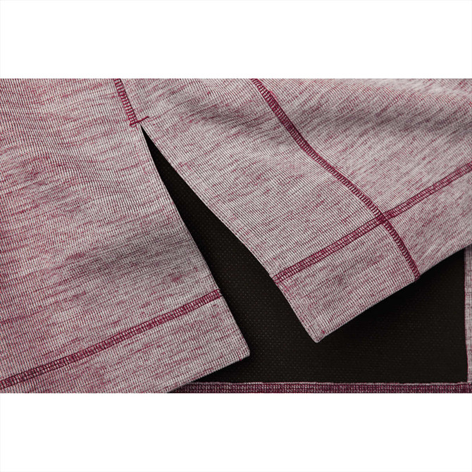 A close-up of a maroon and grey knitted half zip jumper, featuring side slits and contrasting stitching.
