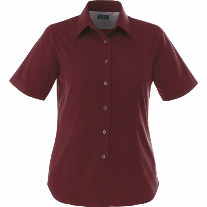 A burgundy short sleeve button-up shirt for women, featuring a classic collar and a logo on the label.