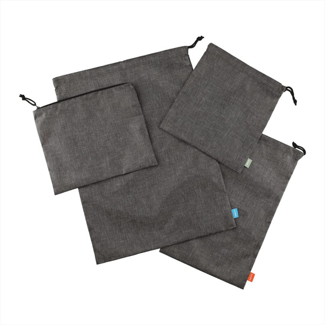 A set of four grey recycled clean bags featuring drawstring closures and a variety of sizes.