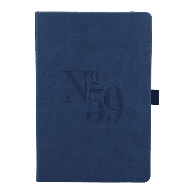 A navy blue recycled hard-bound journal with a textured cover and an embossed design. It features a closure strap and branding.