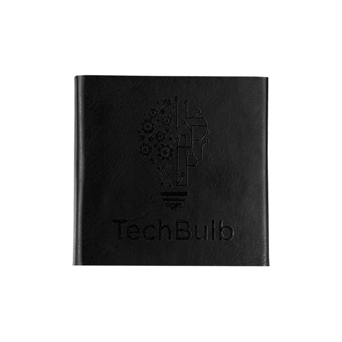 A black notebook features an embossed light bulb design incorporating gears and circuits, with a logo at the bottom.