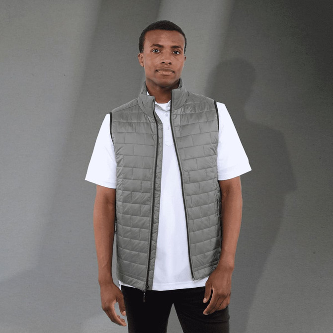 A lightweight, packable insulated puffer vest in grey, featuring a zip closure and a simple design.