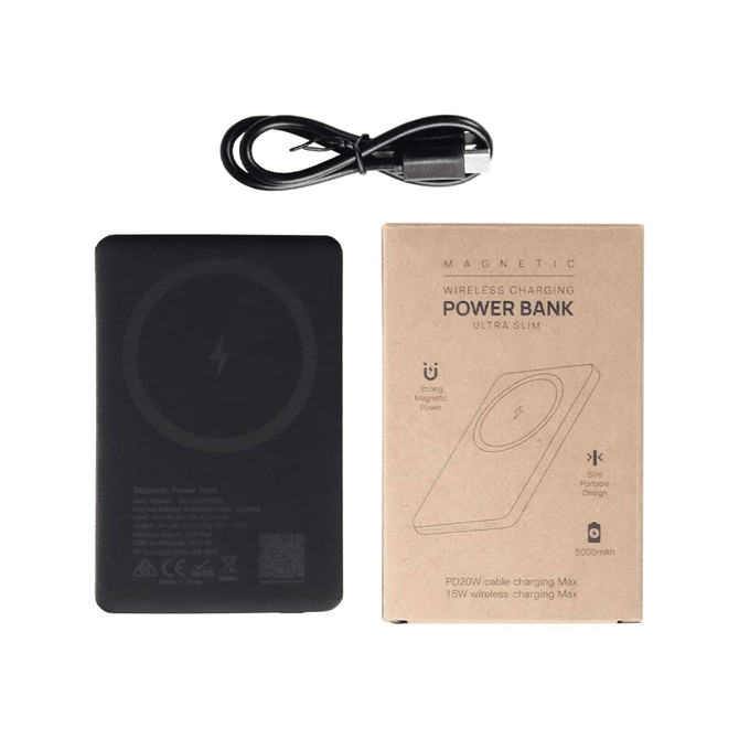 A slim black power bank with a wireless charging surface, accompanied by a charging cable and packaging.
